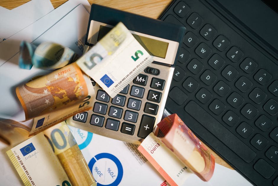 Financial tools with euro banknotes illustrating Super Budget Insurance for financial planning