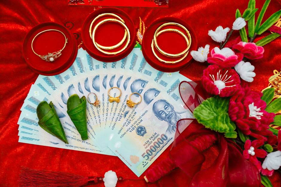 money.com - Vietnamese wedding offerings including money, jewelry, and flowers.
